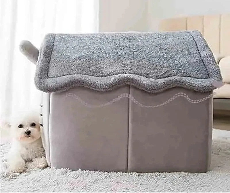 Side view of the grey plush pet house with a small white dog beside it