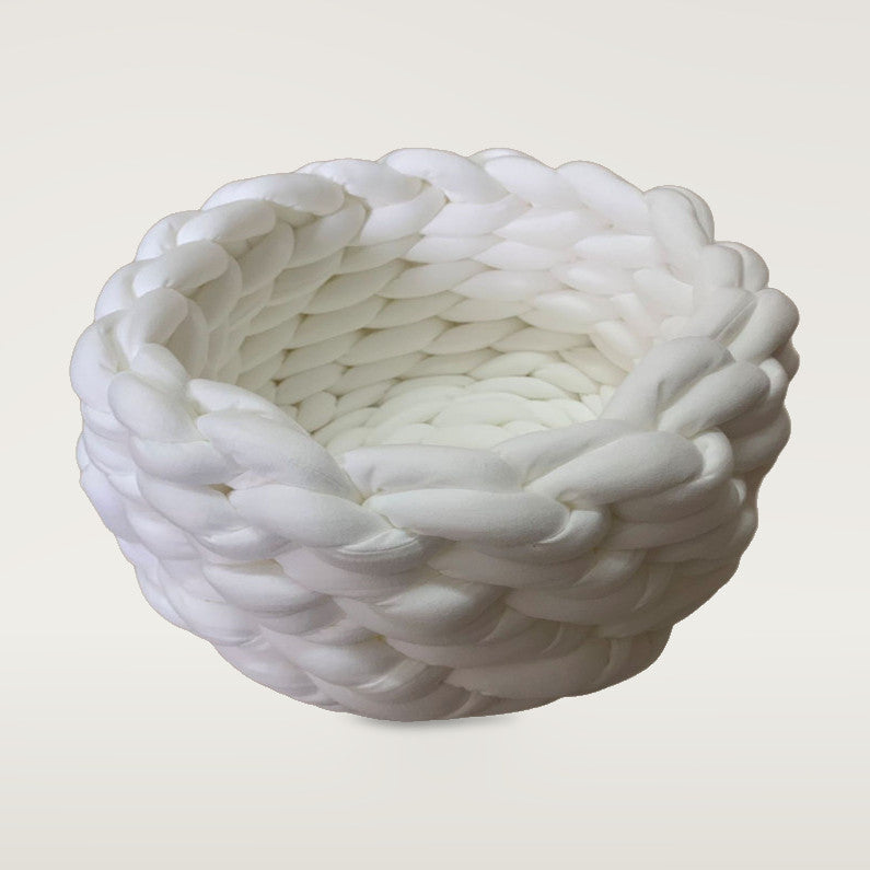 White chunky knitted round cat bed