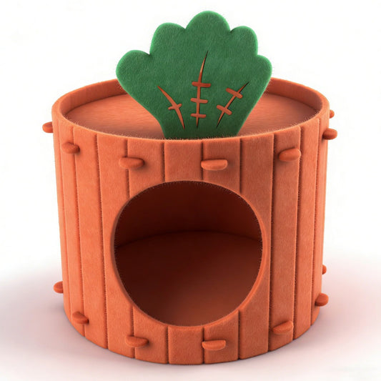 Orange felt cat cave shaped like a carrot, with a round entrance, felt tabs and a green felt leaf on top, on white