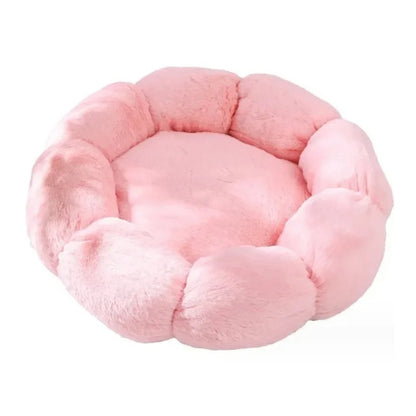Round pink plush cat bed with a ring of puffy petal-shaped lobes