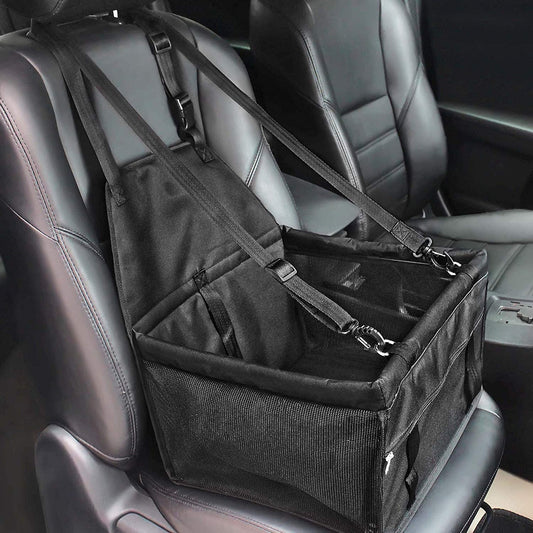 Black hanging dog booster seat strapped to a car front seat