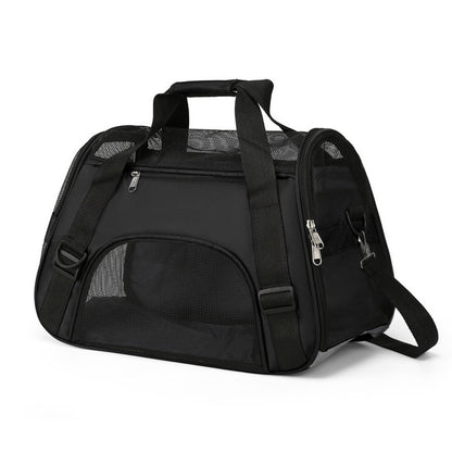 Black soft pet carrier with mesh side panels, two carry handles and a shoulder strap