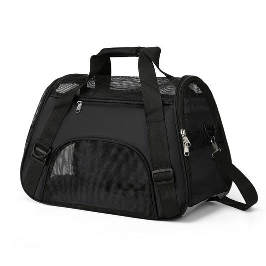 Black soft pet carrier with mesh side panels, two carry handles and a shoulder strap