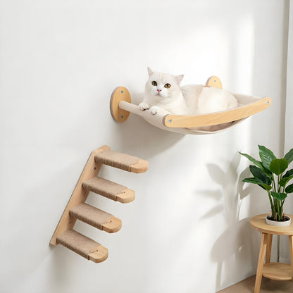 Wall-mounted canvas cat hammock with a white cat and a four-step sisal stairway below it